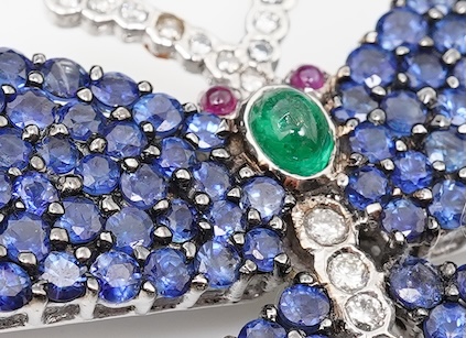 A sapphire, emerald, ruby and diamond brooch